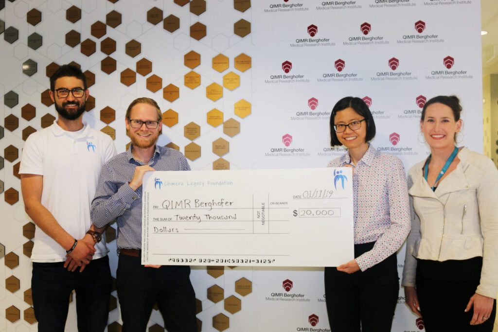 The Chimera Legacy Foundation team presenting a cheque to QIMR Berghofer